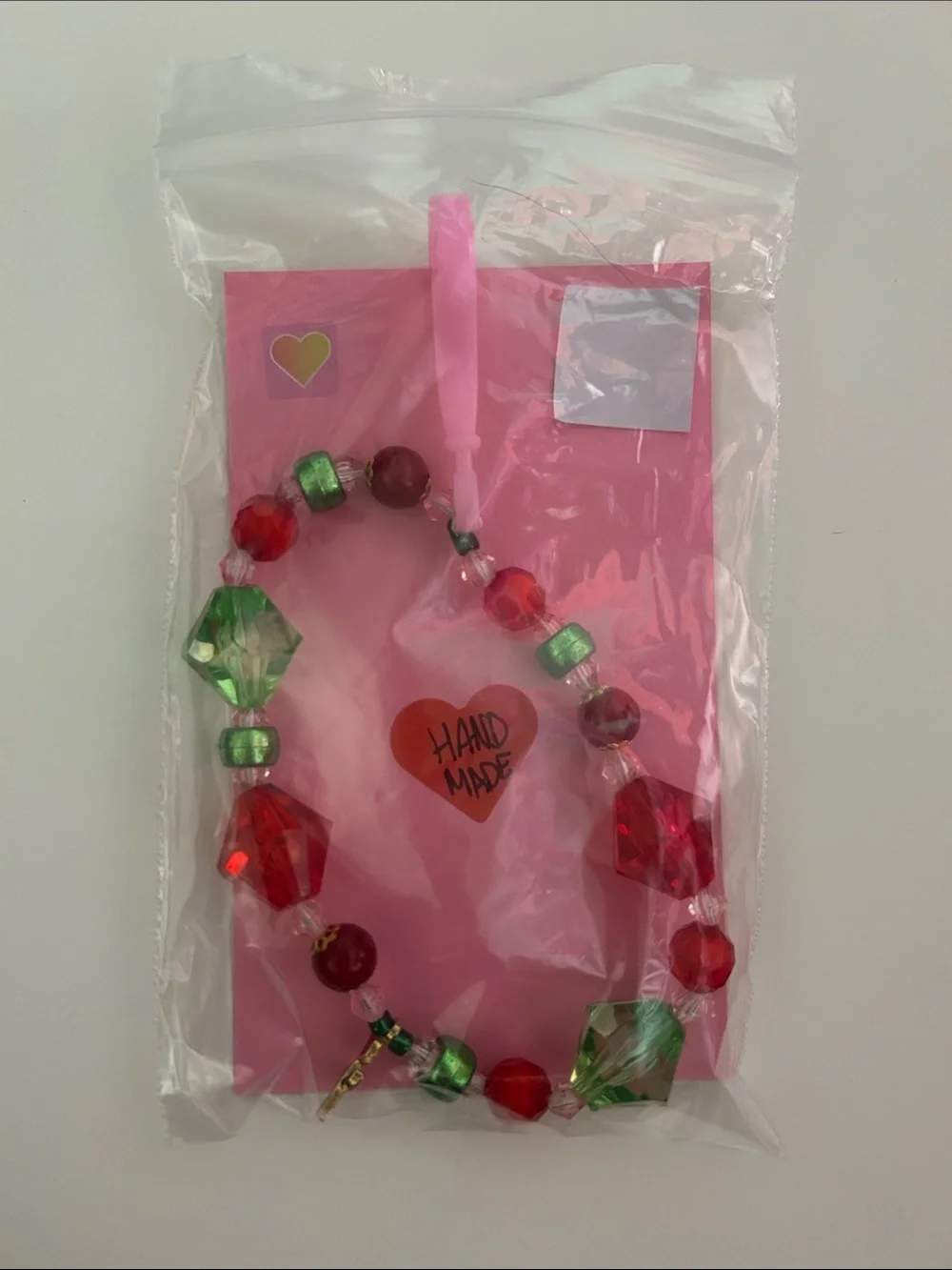 Beaded Red & Green Bracelet with Pink Clip
